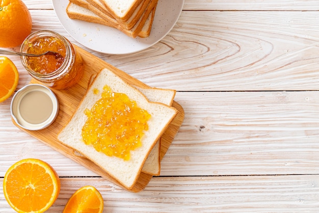 Slices of bread with orange jam