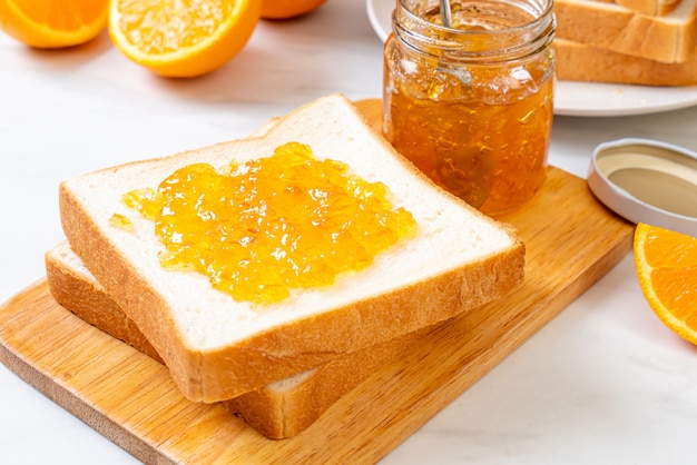 Slices of bread with orange jam