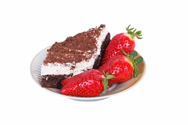 Slices of cake with chocolate and strawberry