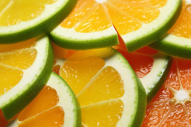 Slices of citrus fruit as a background closeup