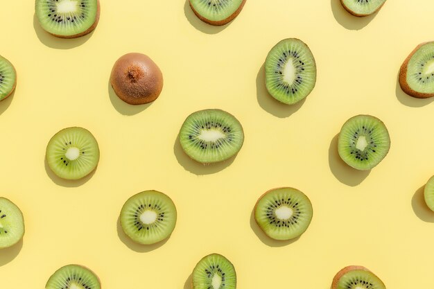 Slices and cuts of kiwi fruit pattern. Healthy eating, travel or vacation concept