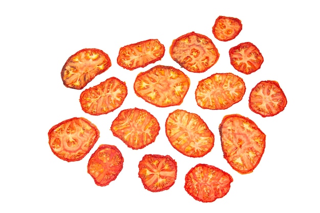 Slices of dried tomato on a white