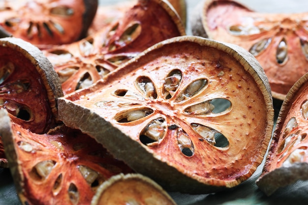 Slices of dry Bael fruit thai tea 