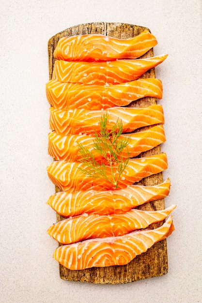 Slices of fresh salmon. Ingredient for cooking healthy seafood.