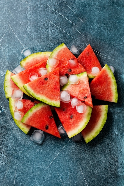 Slices of fresh watermelon with ice