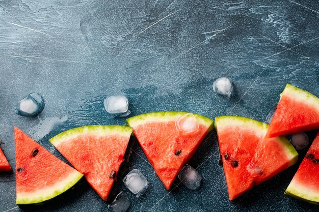 Slices of fresh watermelon with ice