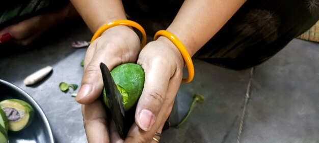 Slices of green mango with raw mango for picklingAsian cuisine