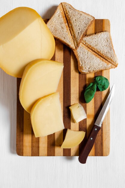 Slices of Holland cheese Edam and dutch goat cheese from Netherlands, top view.