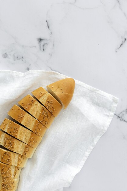 Slices of homemade natural bread from above. Flat lay. Top view