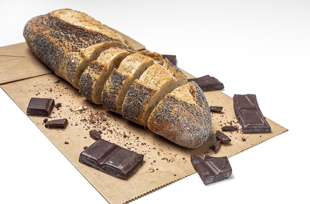 Slices of Homemade Seed Bread with a chocolate bar from above