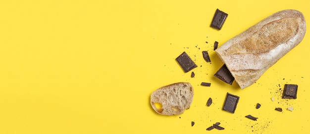 Slices of Homemade Seed Bread with a chocolate bar from above