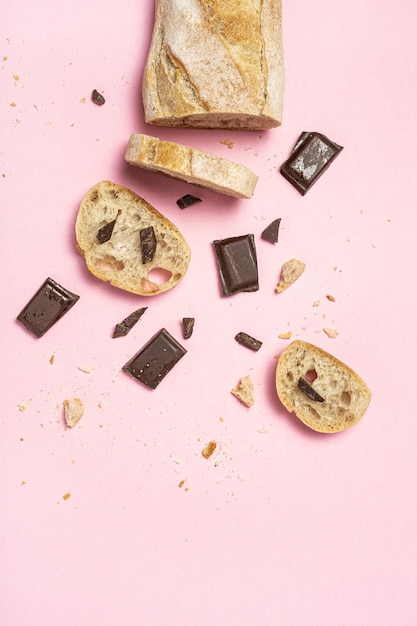 Slices of Homemade Seed Bread with a chocolate bar from above