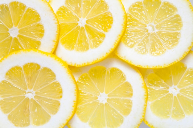 Slices of lemon lie next to each other