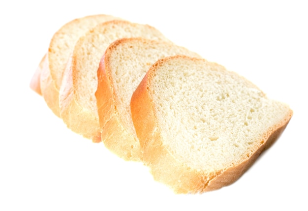 写真 白い背景で隔離の小麦パンのスライス