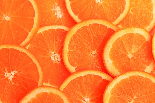 Slices of orange on white background. Flat lay, top view.