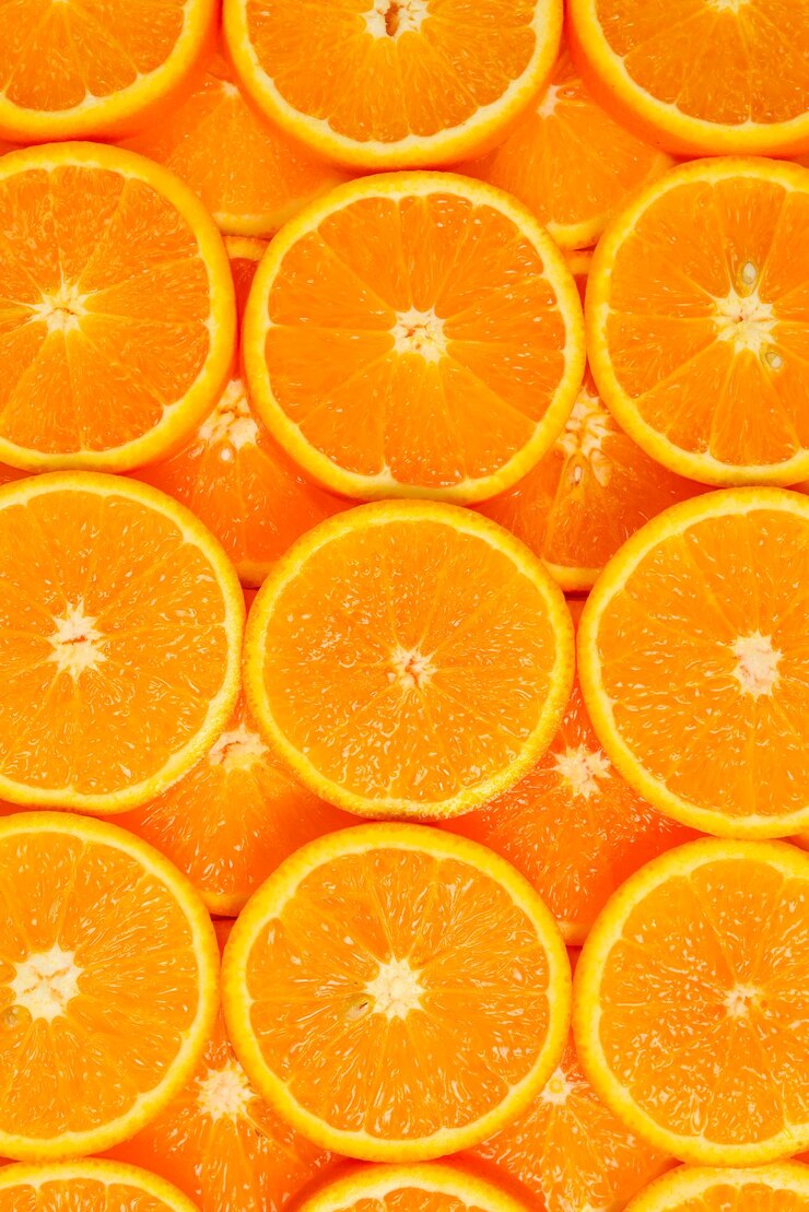 Photo slices of oranges as a background top view