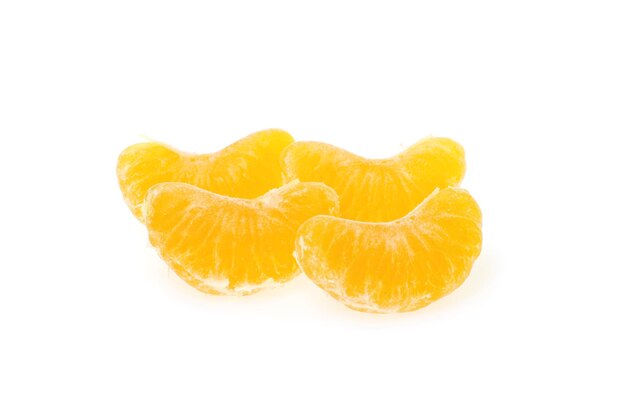 Slices of peeled mandarine on a white background