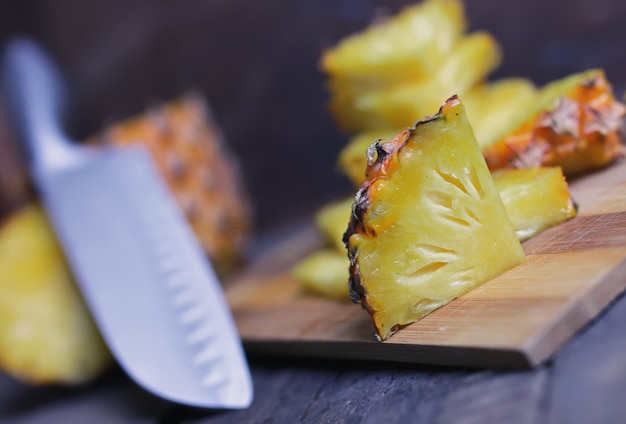 Slices pineapple cut knife