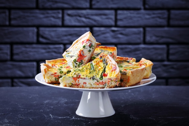 Slices of salmon veggies quiche