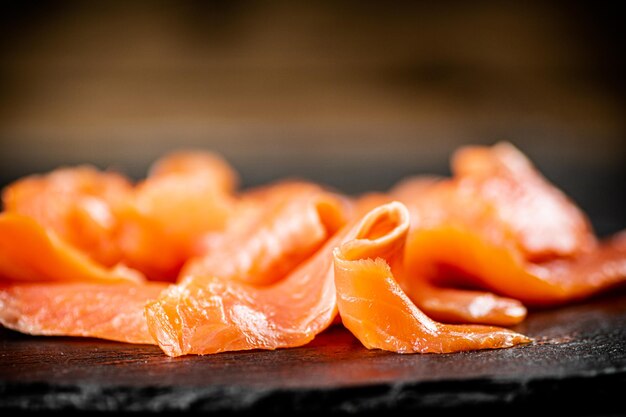 Slices of salted salmon on the table