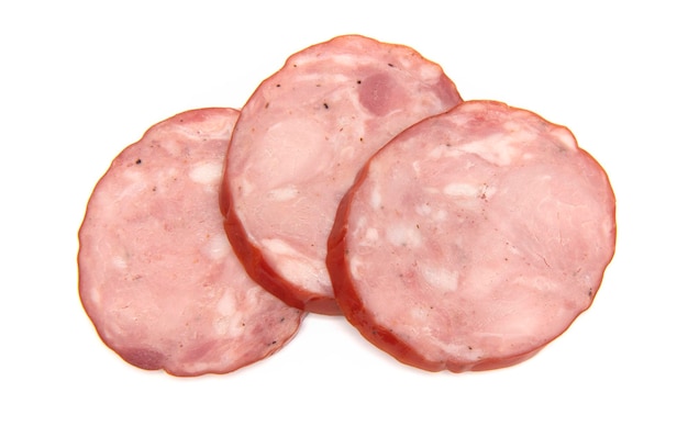 Slices of smoked ham wurst isolated on a white background