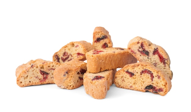 Slices of tasty cantucci with berry on white background Traditional Italian almond biscuits
