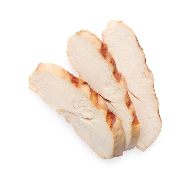 Slices of tasty grilled chicken fillet isolated on white top view