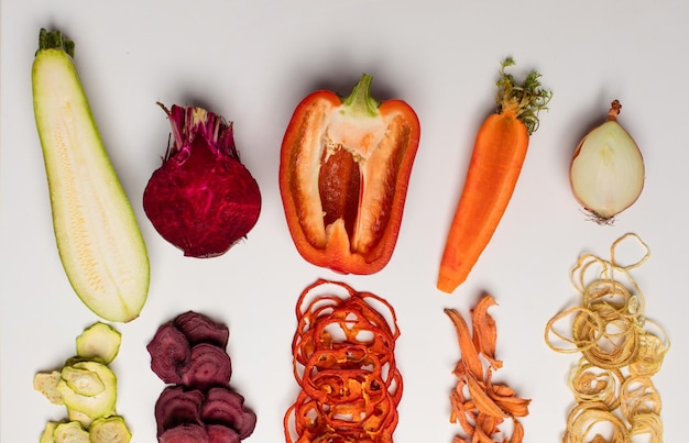 The slices of various dried vegetables as a snack for vegetarians