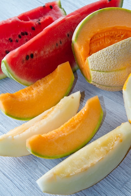 slices of Watermelon and yellow and white melon