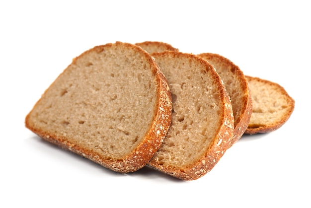 Photo slices of whole wheat bread isolated on white