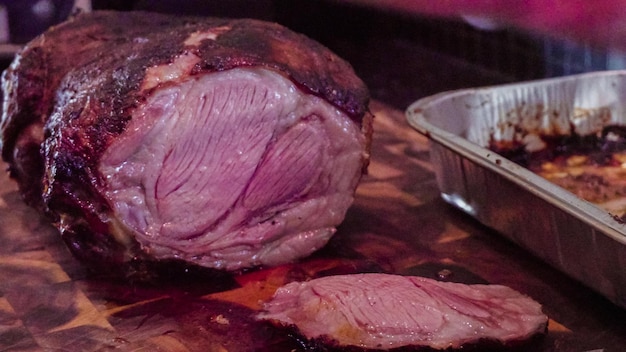 Slicing fresh out of the oven lamb roast.