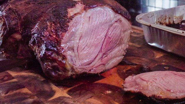 Slicing fresh out of the oven lamb roast.