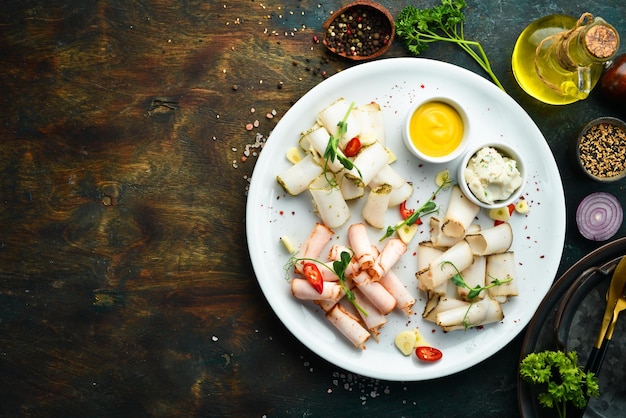 Slicing lard with pepper and salt Ukrainian traditional cuisine Top view Rustic style