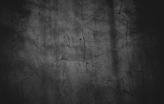 Photo slightly light black concrete cement texture for background dark grunge distressed with scratches scary dark walls overlay