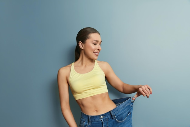 Pink top big pants surprised front Stock Photo by ©alanpoulson 11967069