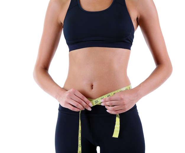 slim girl with centimeter isolated on white