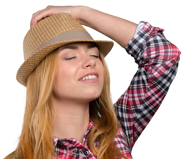 Slim pretty young girl in straw hat