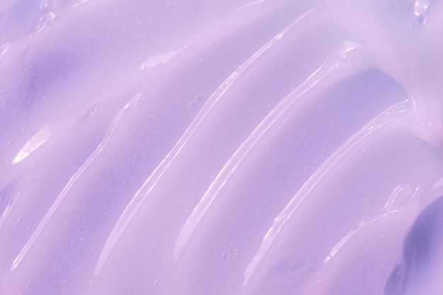 Slime textured background moisturizing beauty creme balm swatch paint lilac cream moisturizer