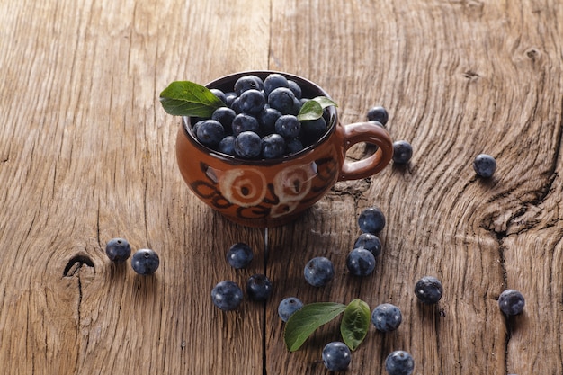 Sloes on wooden table