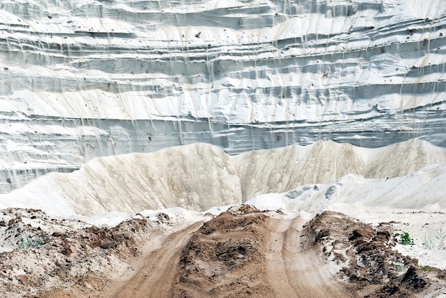 Slope of sandy mountain from white sand