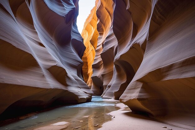 Photo a slot canyon outside of page arizona beautiful colours and sandstone caused by eons of wind and water erosion page arizona united states of america