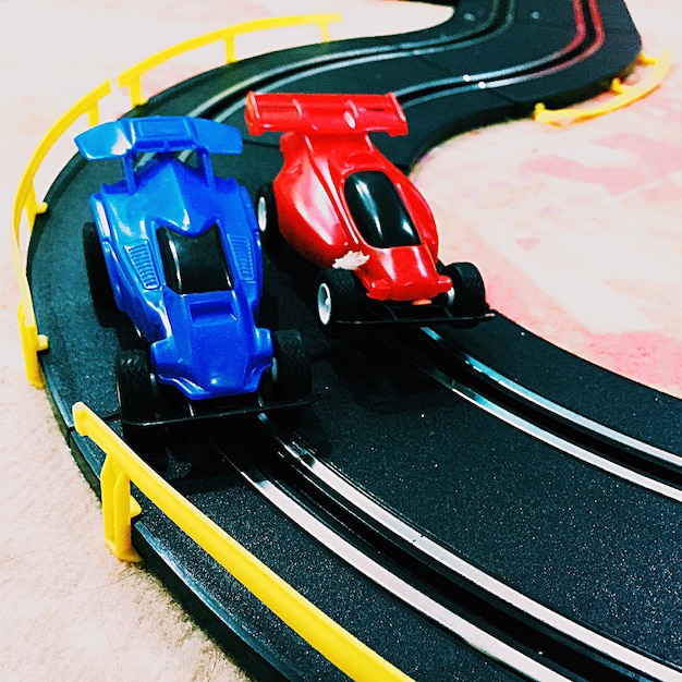 Slot cars on racing track