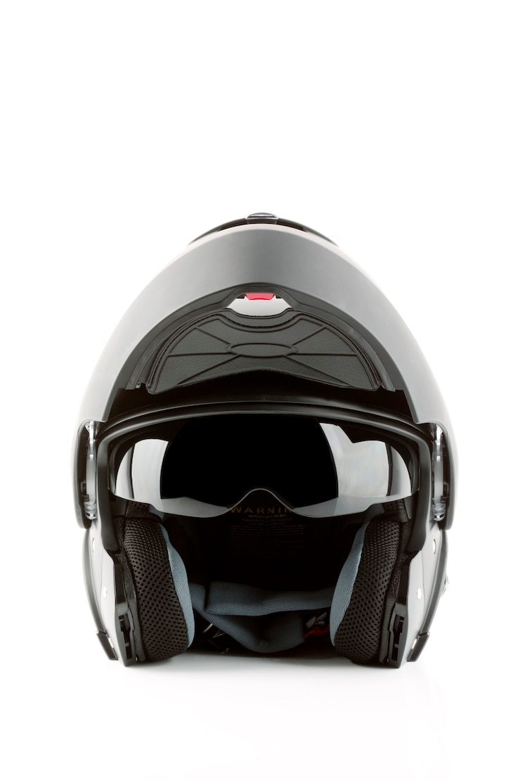 Foto sluit omhoog op geïsoleerde motorhelm