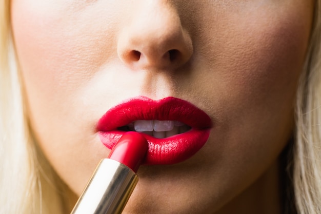 Sluit omhoog van lippen met make-up op hen