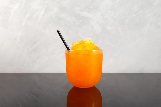 Slushie drankje Orange Granizado Verfrissende zomerse ijsdrank Sweet Shaved ijs met sinaasappelsap