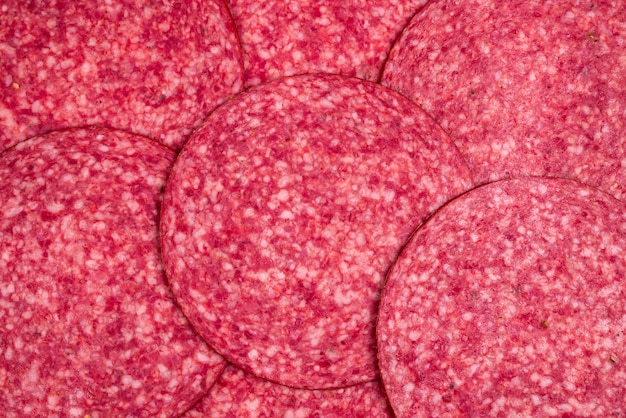 Smakelijke salami segmenten achtergrond