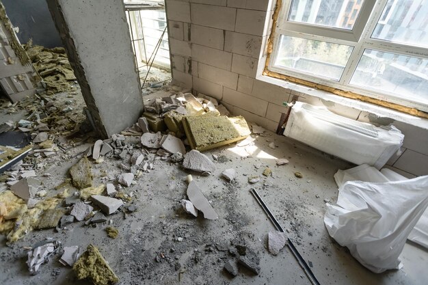 Small apartment without repair in a new building. A room in an unfinished house. Walls of foam block and concrete floor in a tiny apartment.