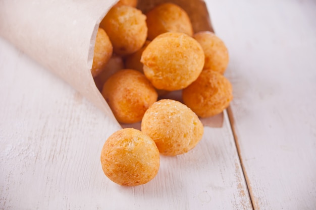 Small balls of freshly baked homemade cottage cheese doughnuts