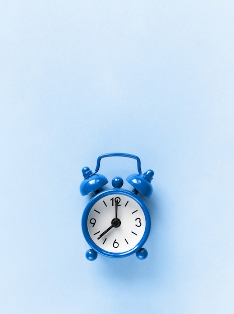 Small blue alarm clock