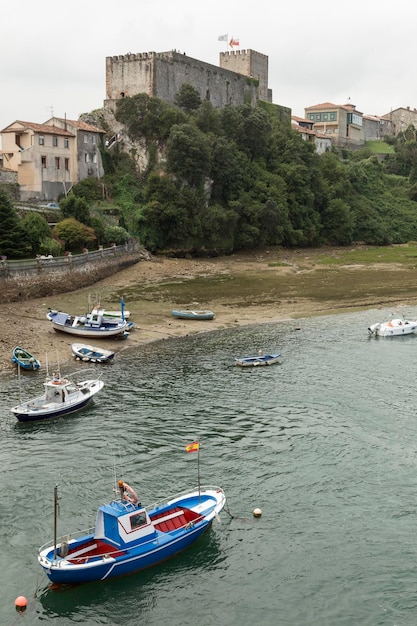 Small boats stranded in San Vicente de la Barquera Cantabria Spain